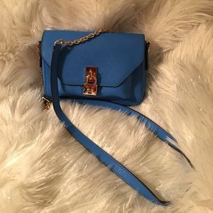 Henri Bendel blue purse with gold chain